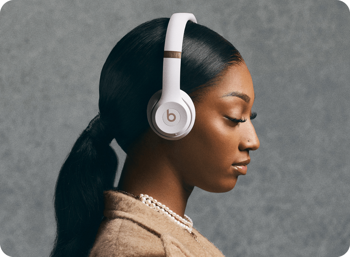 Angel Reese wearing Beats Solo 4 in Cloud Pink 