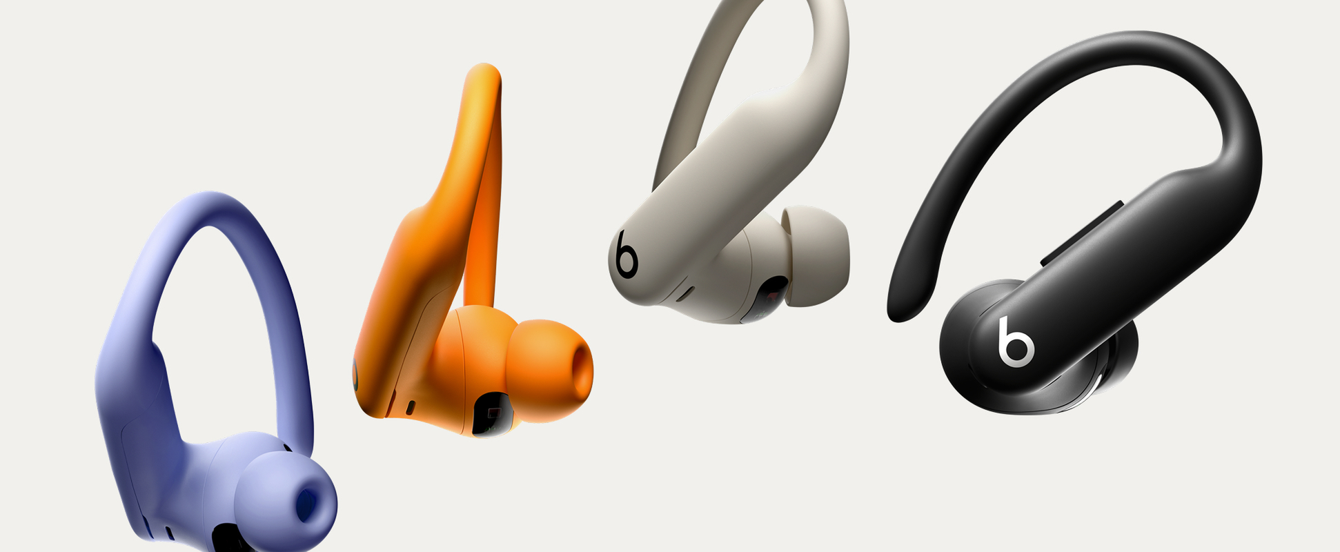 Powebeats Pro 2 family in Hyper Purple, Electric Orange, Quick Sand, and Jet Black