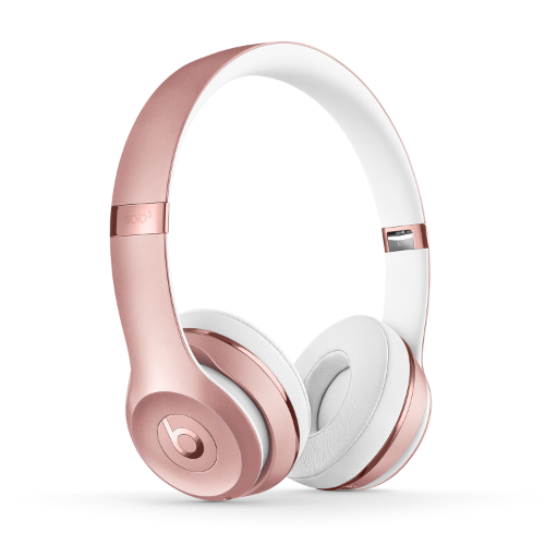 Um par de headphones wireless Beats Solo 3 ouro rosa