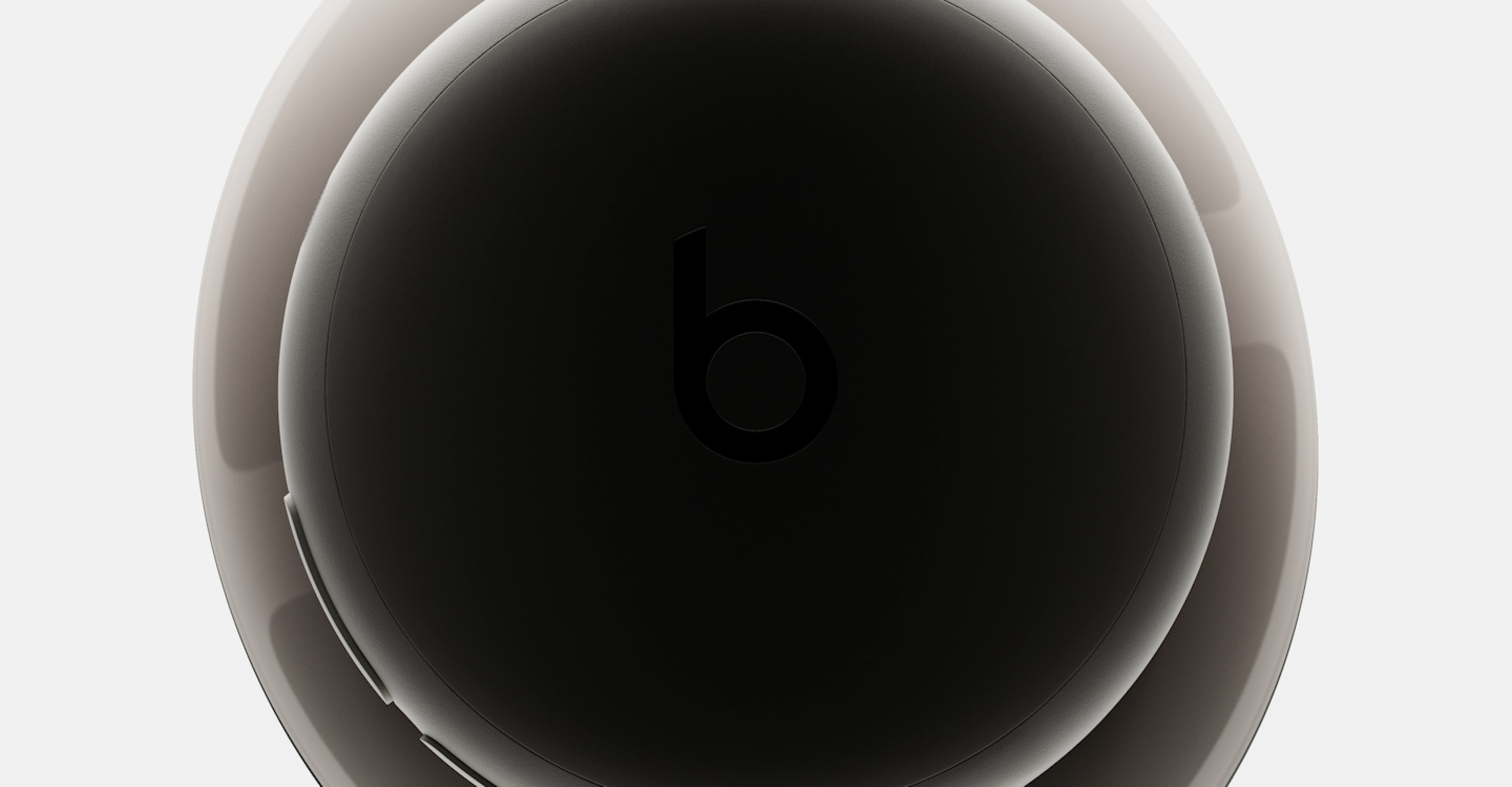 Close-up of Beats 360 headphone demonstrating earcups and headband cushion interchangeability.