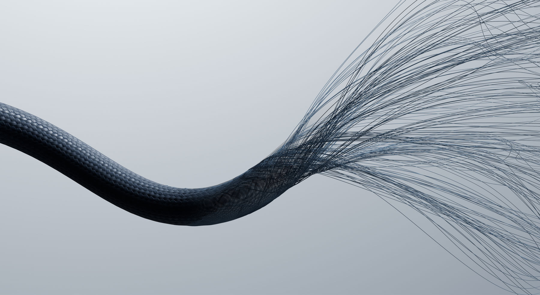 Woven fibers weaving into a Beats cable, demonstrating durability and weave pattern. 