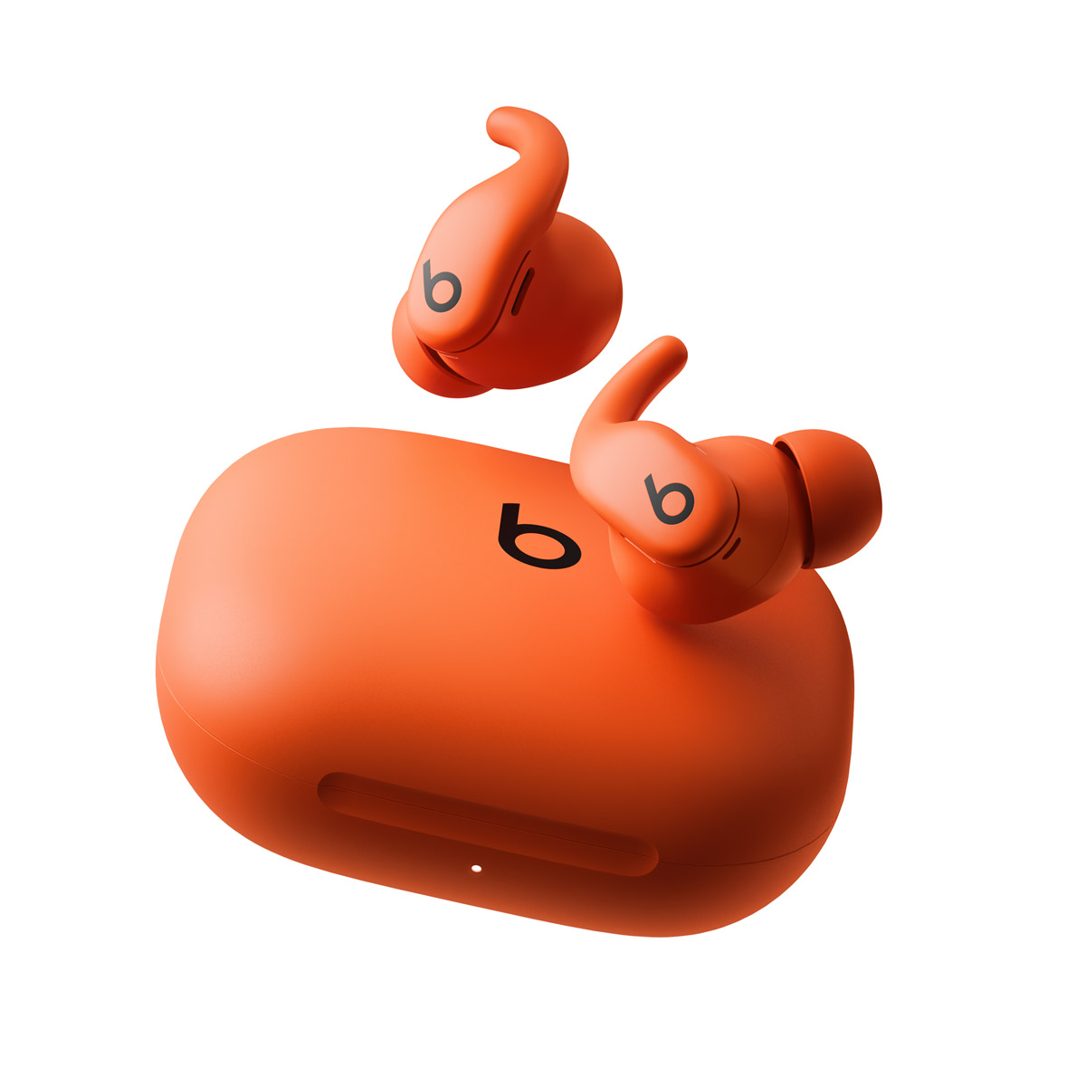 Close-up of Powerbeats Fit in Spark Orange.