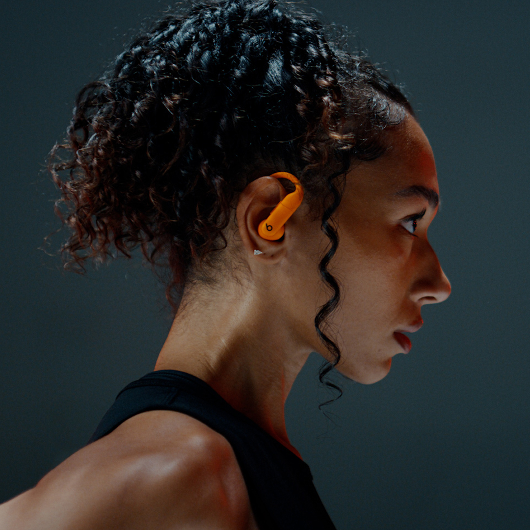 side view of female wearing Powerbeats Pro 2