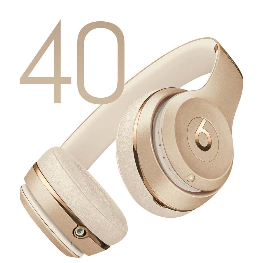 Angled view of a Beats Solo3 Wireless headphone in Gold next to a graphic of the number ’40'
