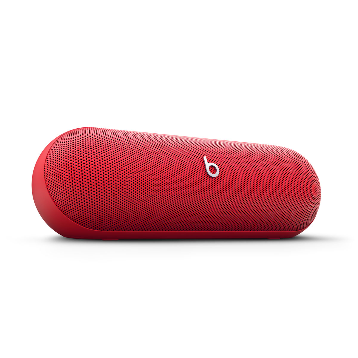 Close-up of Beats Pill in Statement Red with Best of 2025 Gizmodo badge and 2024 Wired Recommends badge.