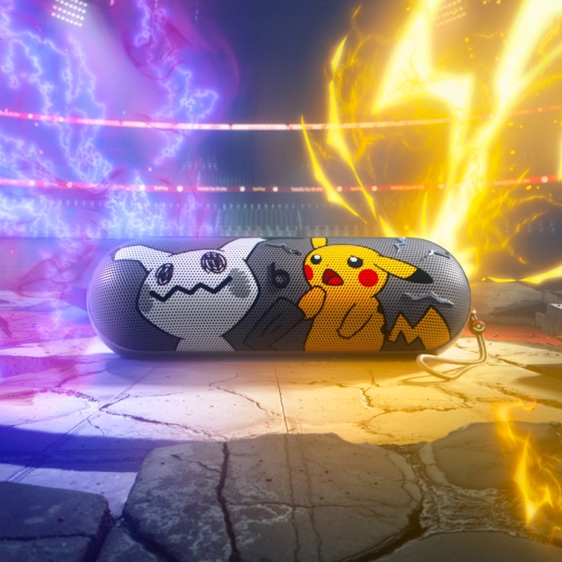 Front view of the Beats Pill – Pokémon special-edition portable Bluetooth® speaker, featuring Pikachu and Mimikyu characters on the front grill.
