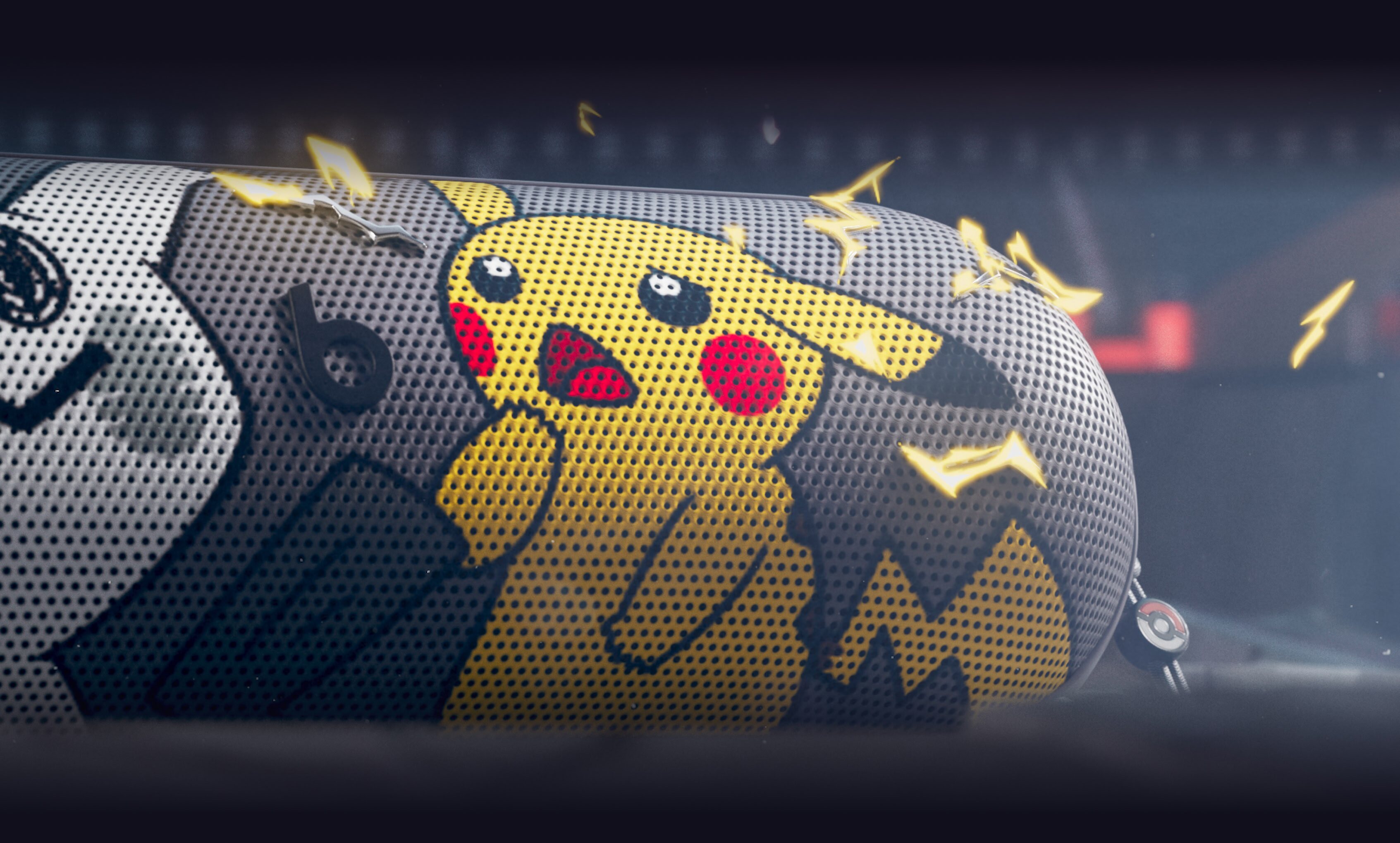 Front view of the Beats Pill – Pokémon special-edition portable Bluetooth® speaker, featuring Pikachu and Mimikyu characters on the front grill.